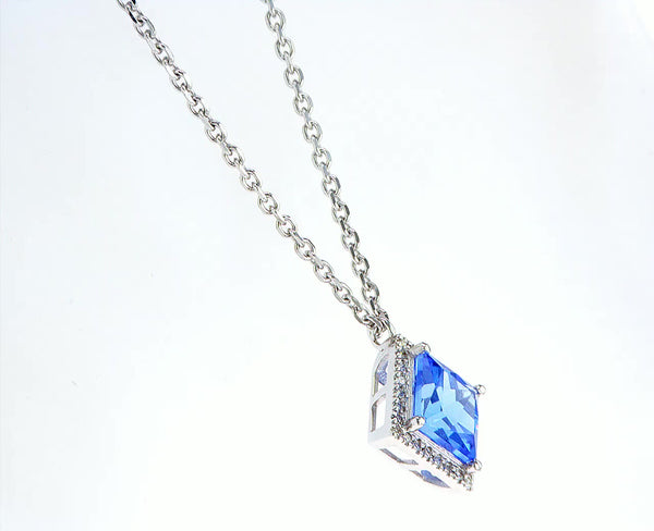 Princess cut blue topaz with diamond halo necklace