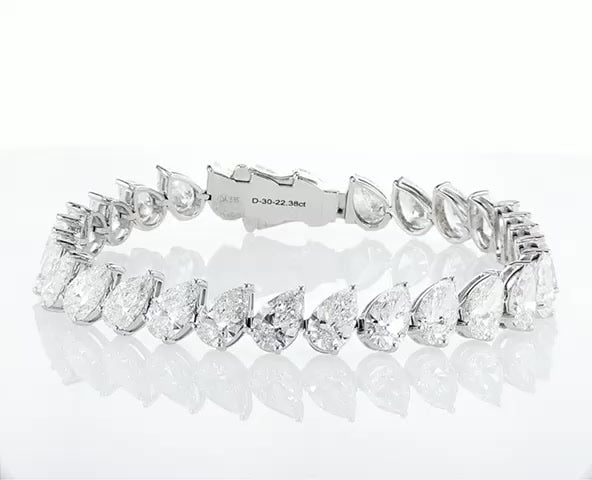 Leaning Pear Cut Diamond Tennis Bracelet