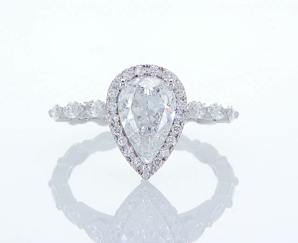 Pear cut with a Diamond Halo and Marquises Band