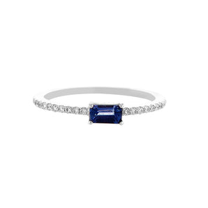 Purple sideway emerald cut sapphire with a pavé band