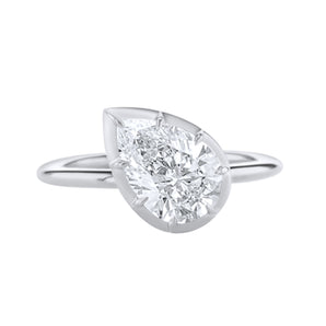 Sideway pear diamond button ring