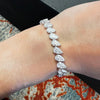 Leaning Pear Cut Diamond Tennis Bracelet