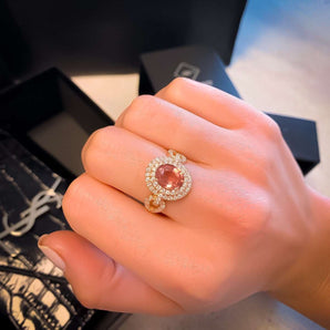 Oval cut Pink Diamond & Double Halo Ring